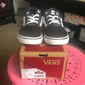 Vans slip on. Black and white.